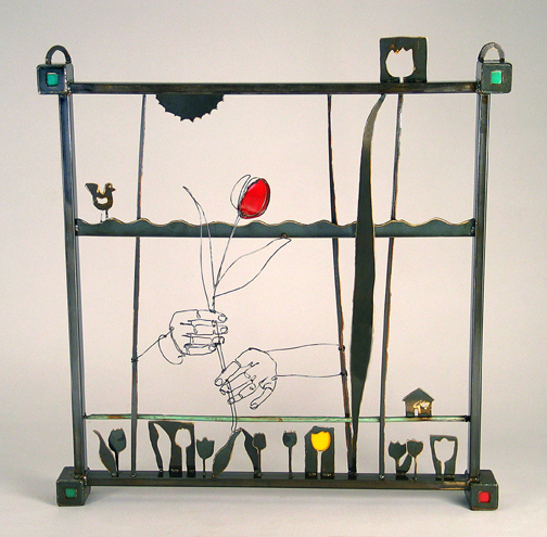 Wire sculpture of hands holding tulip flower